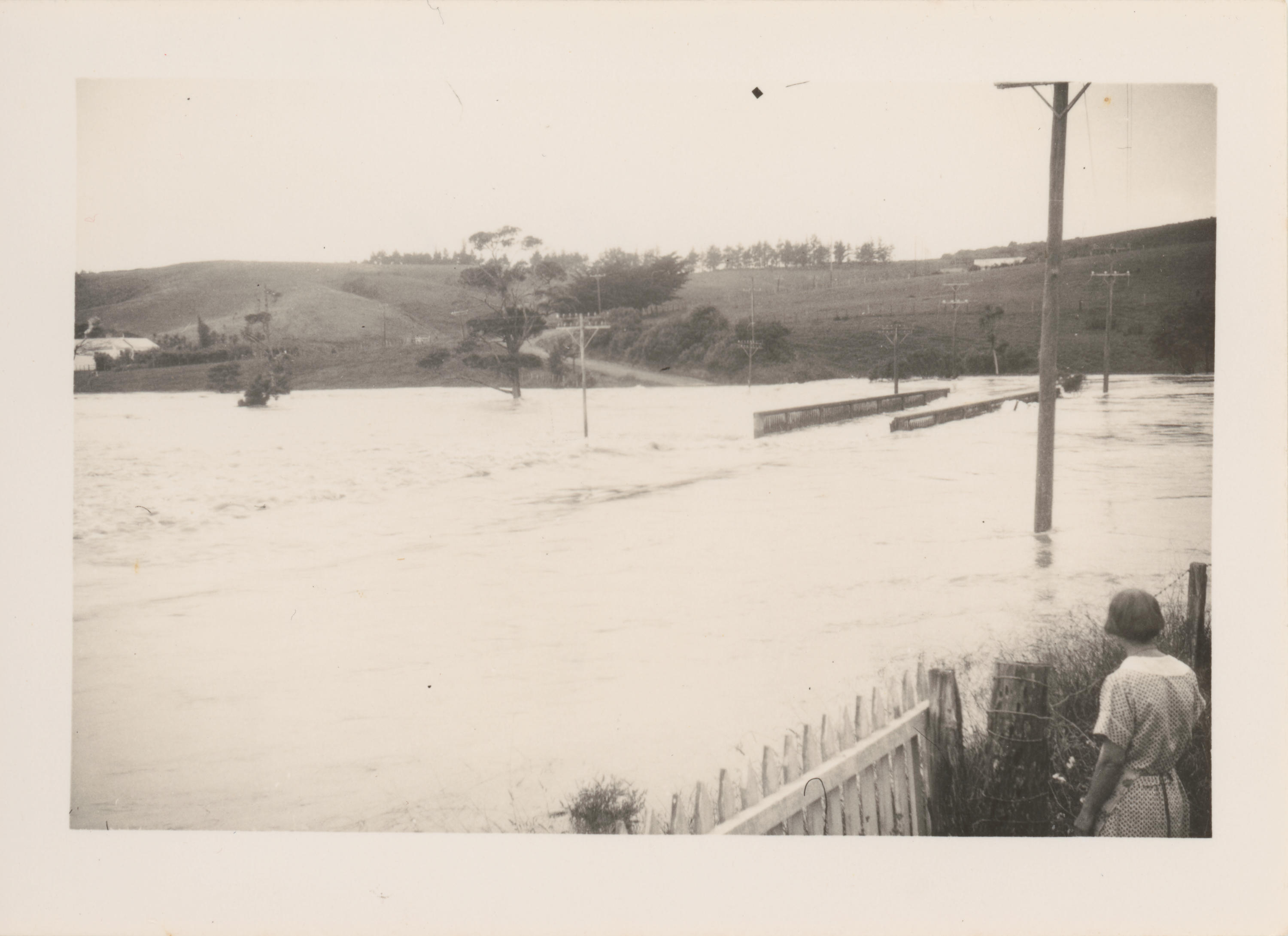 Photograph Floods at Waimauku after cyclone New Zealand Maritime Museum