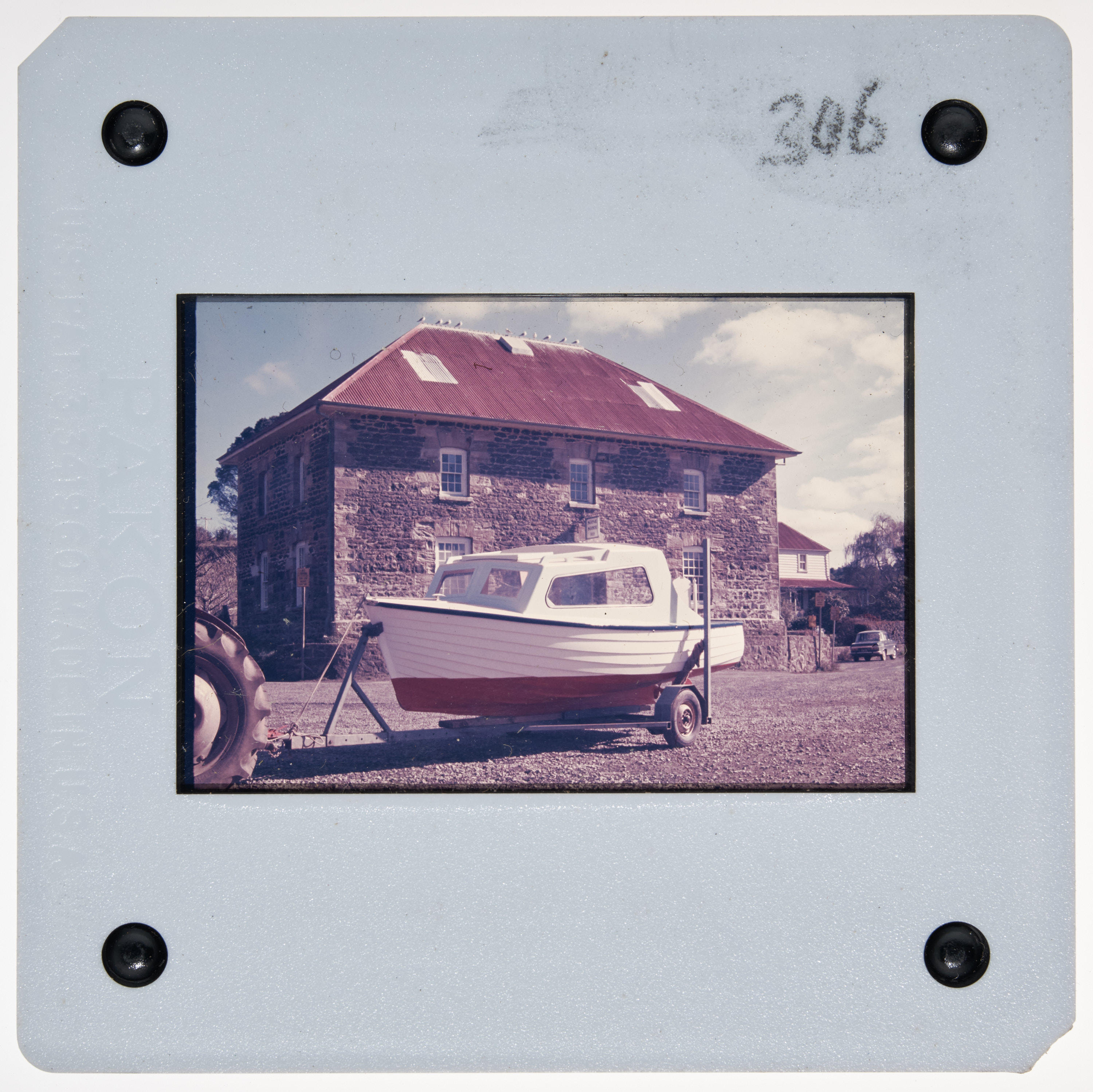 Slide Stone Store and vessel on trailer in foreground, Kerikeri, slide