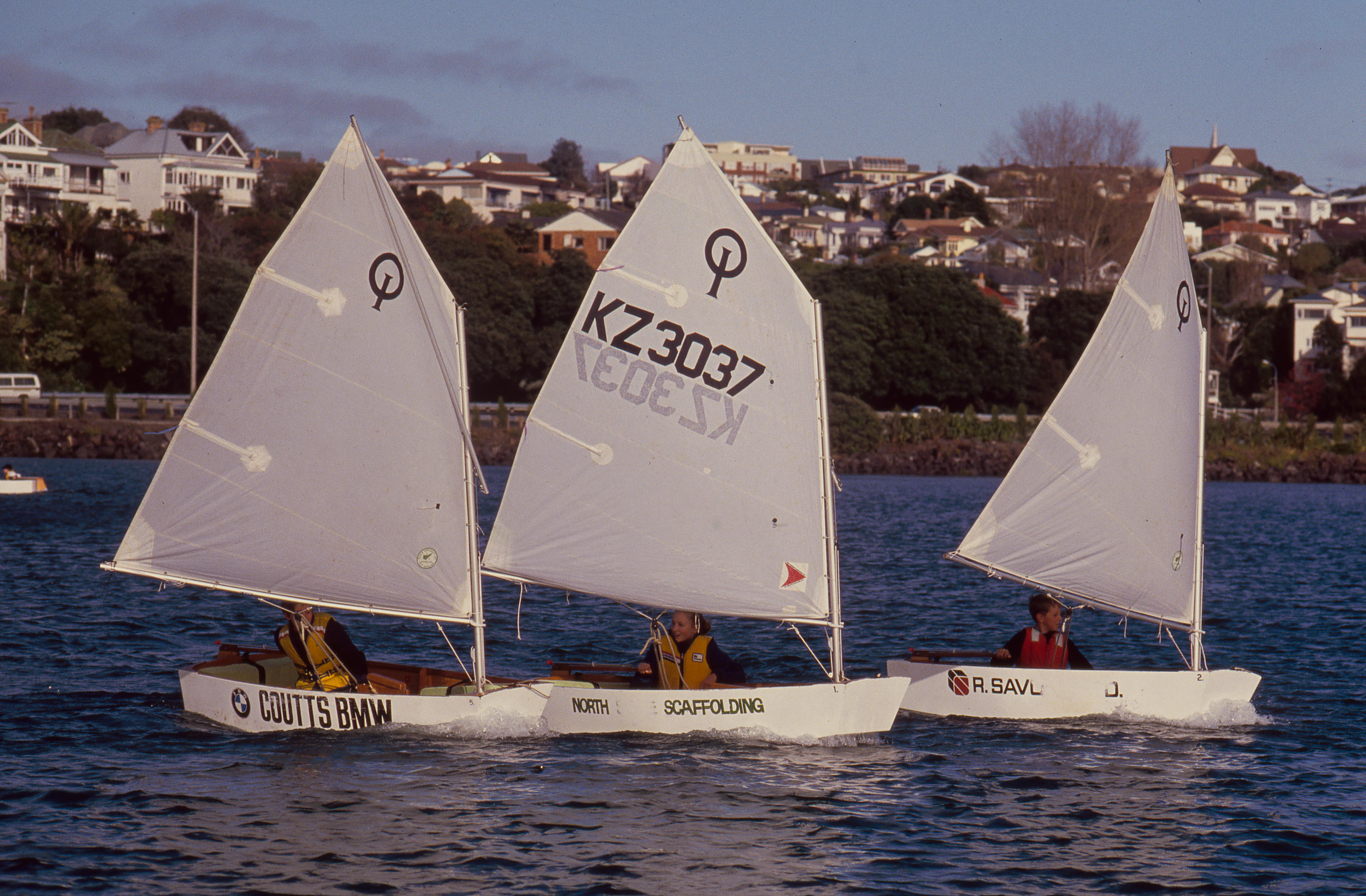 Slide Optimist sailing dinghies in the 1992 Auckland Anniversary Day
