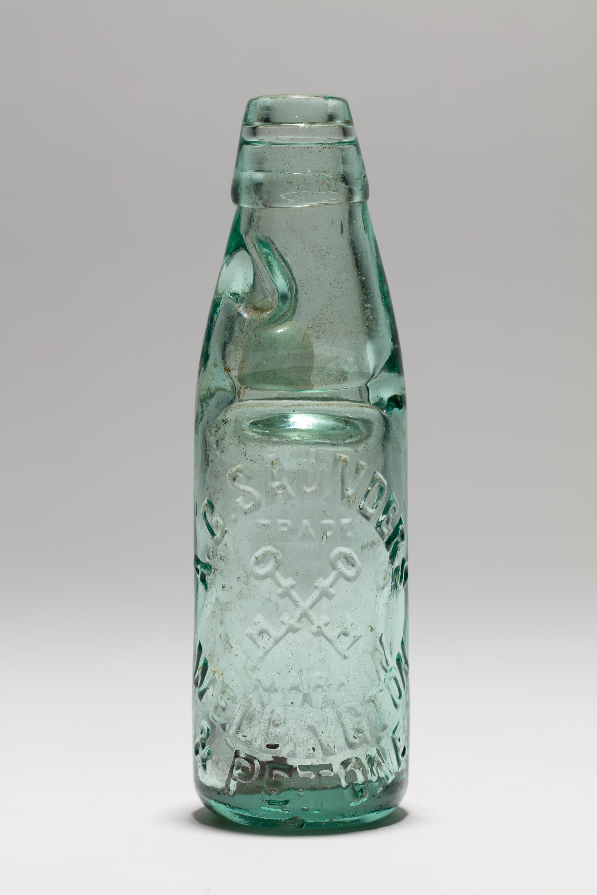 Glass bottle A.G. Saunders New Zealand Maritime Museum